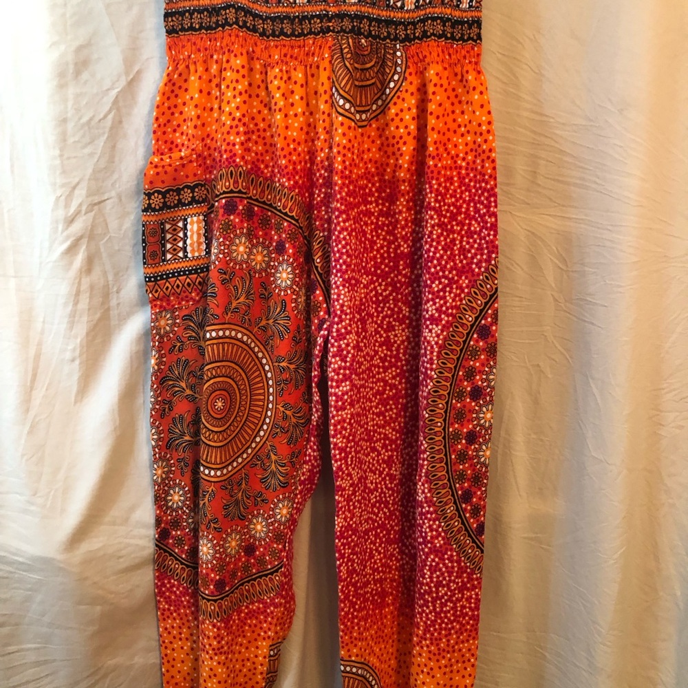 Vibrant Orange and Red Patterned Pants